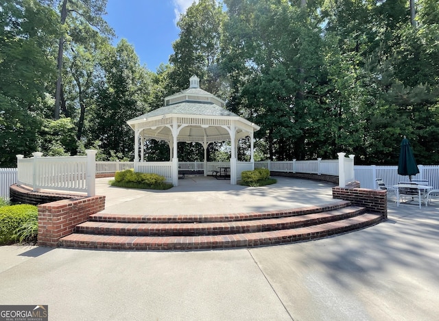 44 Arbor Way, Newnan, GA 30265 - view of property's community featuring a gazebo, a patio area, and view of wooded area