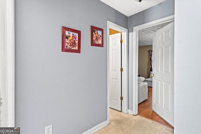 995 Chimney Trace Way, Lawrenceville, GA 30045 - corridor featuring baseboards