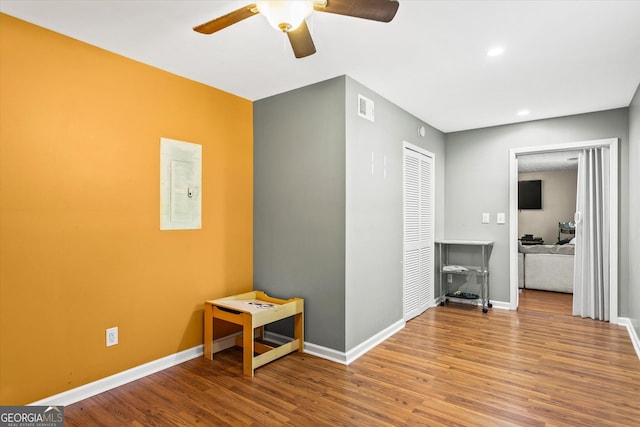 995 Chimney Trace Way, Lawrenceville, GA 30045 - empty room with ceiling fan, wood finished floors, electric panel, and recessed lighting