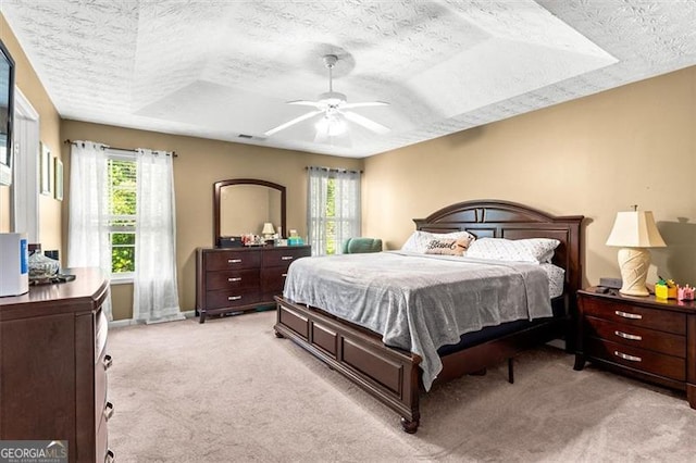 995 Chimney Trace Way, Lawrenceville, GA 30045 - bedroom featuring a textured ceiling, light colored carpet, and a ceiling fan