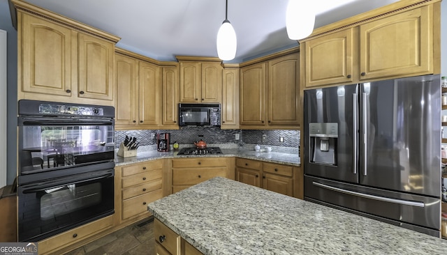 kitchen with black appliances, light stone countertops, decorative backsplash, pendant lighting, and dark stone finish flooring