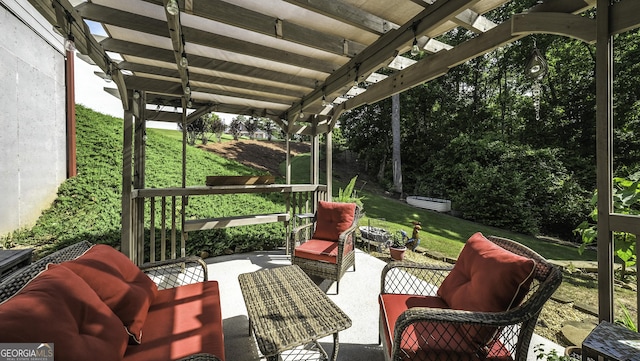 view of patio featuring a pergola and an outdoor hangout area