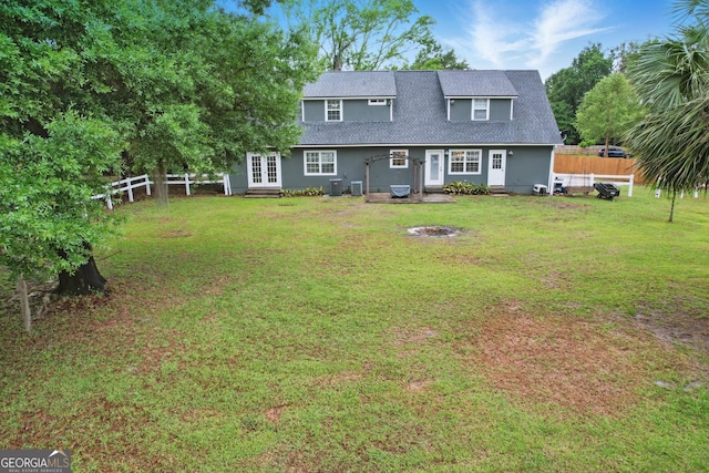 194 Retreat Pl, Woodbine, GA 31569 - back of house with french doors, entry steps, and roof with shingles