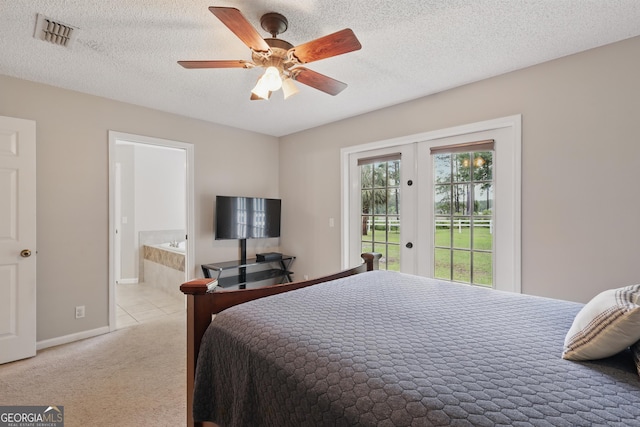 194 Retreat Pl, Woodbine, GA 31569 - bedroom with access to outside, french doors, carpet, connected bathroom, and a ceiling fan