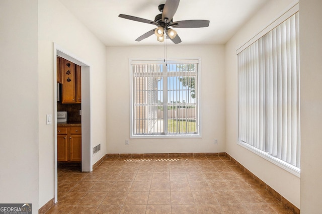 2770 Nautical Way, Villa Rica, GA 30180 - spare room featuring a ceiling fan and baseboards