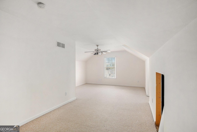 2770 Nautical Way, Villa Rica, GA 30180 - additional living space featuring vaulted ceiling, light colored carpet, and ceiling fan