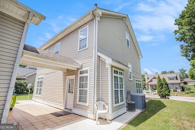 2770 Nautical Way, Villa Rica, GA 30180 - rear view of house with a yard and a patio