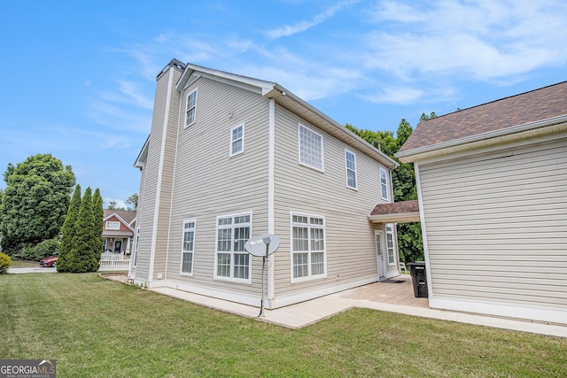 2770 Nautical Way, Villa Rica, GA 30180 - rear view of property with a yard and a patio area