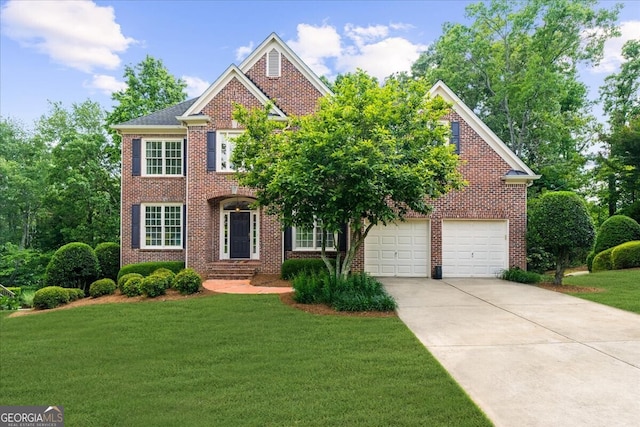 7049 Bennington Ln, Cumming, GA 30041 - colonial house featuring brick siding, a front lawn, and driveway