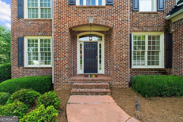 7049 Bennington Ln, Cumming, GA 30041 - view of exterior entry featuring brick siding