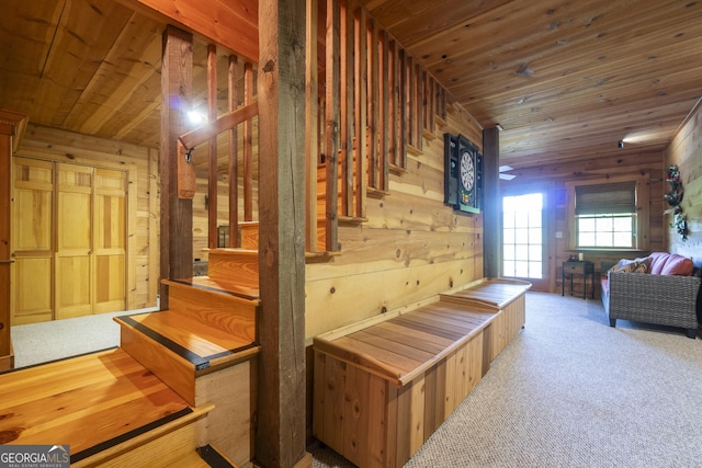 451 Pinecrest Rd, Sautee Nacoochee, GA 30571 - hallway featuring wood ceiling, wooden walls, and carpet