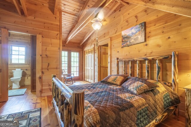 451 Pinecrest Rd, Sautee Nacoochee, GA 30571 - bedroom featuring wood walls, light wood-type flooring, wood ceiling, and ensuite bath