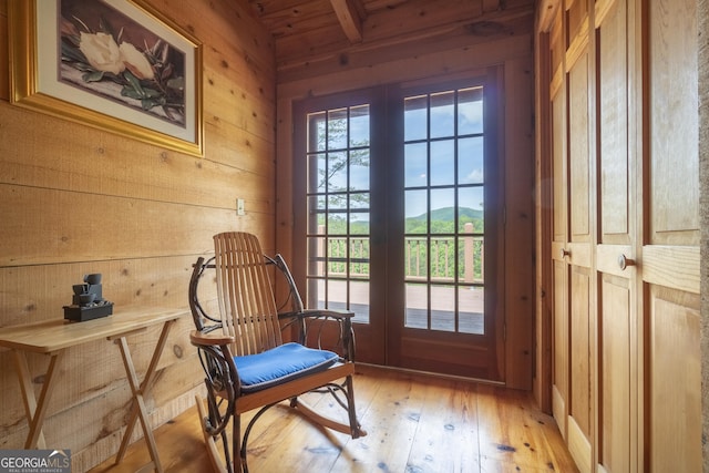 451 Pinecrest Rd, Sautee Nacoochee, GA 30571 - sitting room with wooden walls, light wood-style floors, wooden ceiling, beamed ceiling, and a mountain view