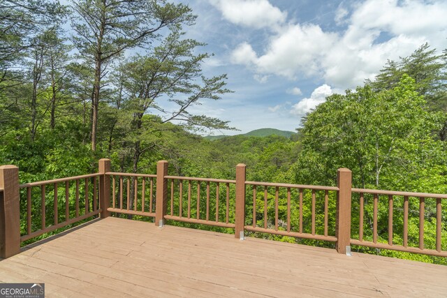 451 Pinecrest Rd, Sautee Nacoochee, GA 30571 - wooden terrace featuring a wooded view and a mountain view