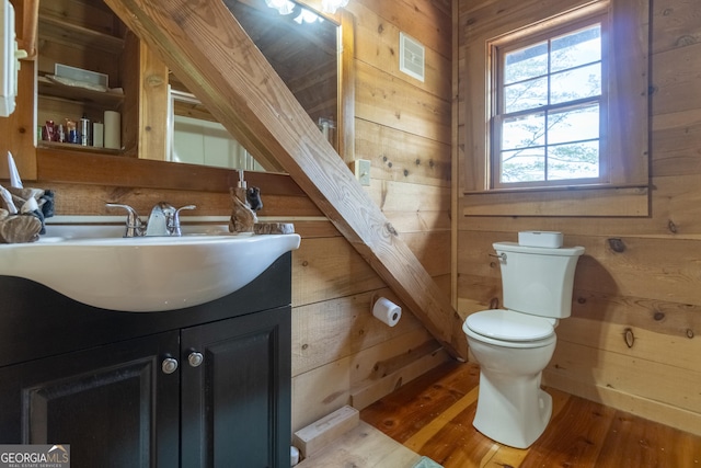 451 Pinecrest Rd, Sautee Nacoochee, GA 30571 - bathroom featuring wood walls, toilet, vanity, and wood finished floors