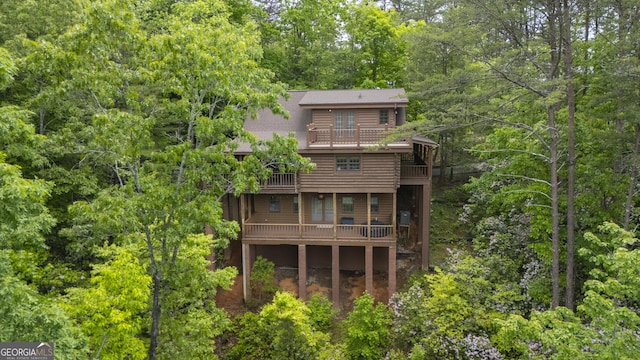 451 Pinecrest Rd, Sautee Nacoochee, GA 30571 - back of property featuring a balcony and a wooded view