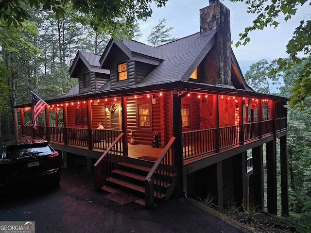 451 Pinecrest Rd, Sautee Nacoochee, GA 30571 - back of house featuring a porch, stairs, log exterior, a chimney, and roof with shingles