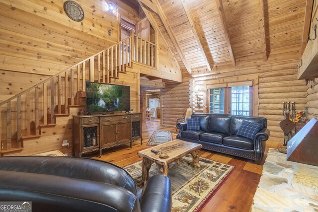 451 Pinecrest Rd, Sautee Nacoochee, GA 30571 - living room featuring stairs, wooden ceiling, high vaulted ceiling, beam ceiling, and rustic walls
