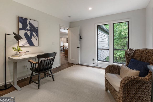 office space with wood finished floors, baseboards, and recessed lighting