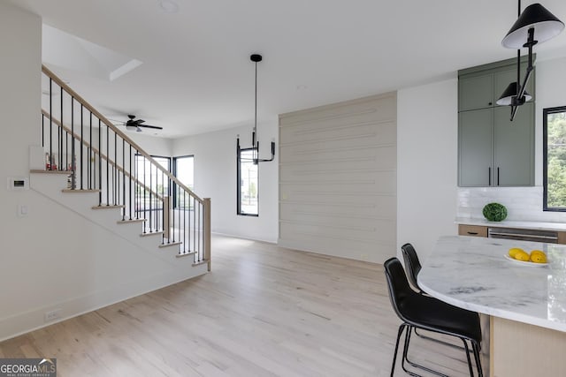 1954 8th St, Chamblee, GA 30341 - dining area featuring light wood-type flooring, plenty of natural light, and stairs