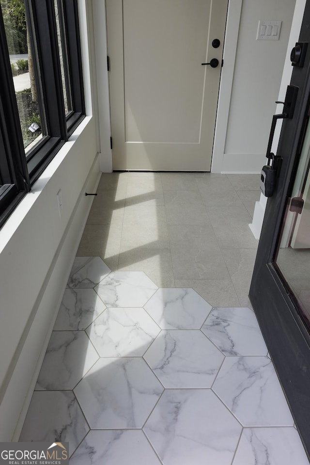 1954 8th St, Chamblee, GA 30341 - corridor featuring light marble finish flooring