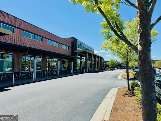 1954 8th St, Chamblee, GA 30341 - view of asphalt street featuring curbs