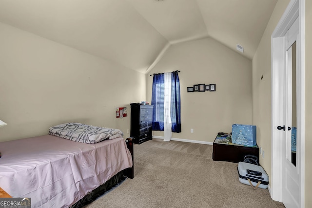 4581 Sagebrush Ct, Snellville, GA 30039 - carpeted bedroom with vaulted ceiling and baseboards