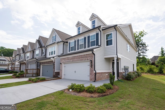668 Isom Walk, Suwanee, GA 30024 - multi unit property with a garage, brick siding, driveway, a front yard, and a residential view