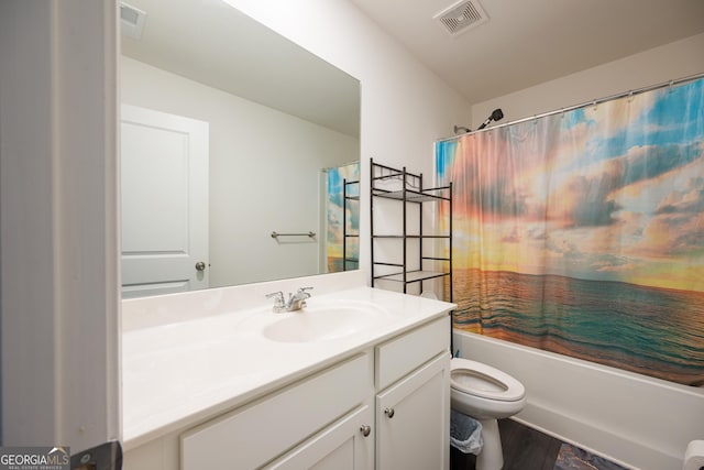 668 Isom Walk, Suwanee, GA 30024 - full bath featuring toilet, shower / bath combo, vanity, and wood finished floors