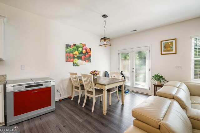 668 Isom Walk, Suwanee, GA 30024 - dining space featuring dark wood-style flooring and french doors