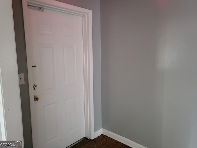 957 Astor Ave, Forest Park, GA 30297 - entryway featuring baseboards and dark wood-type flooring