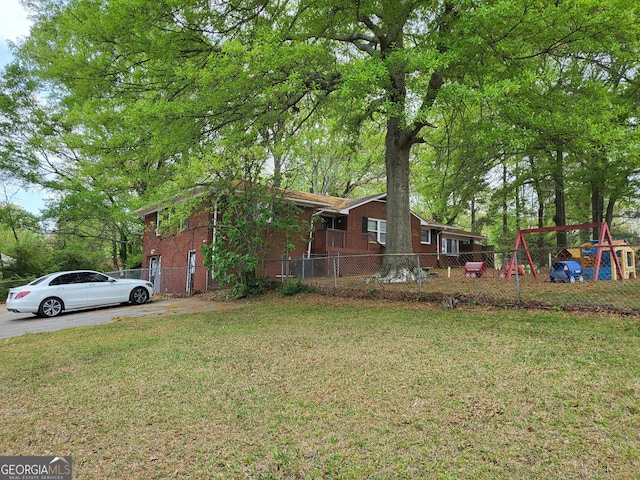 957 Astor Ave, Forest Park, GA 30297 - view of yard with a playground