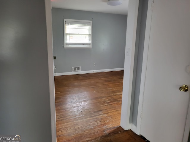 957 Astor Ave, Forest Park, GA 30297 - unfurnished room with wood-type flooring and baseboards