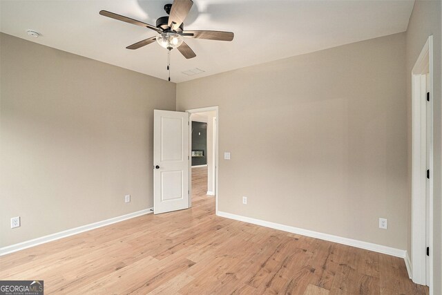 1573 Cabin Creek Trl, Griffin, GA 30223 - unfurnished room with ceiling fan, light wood-type flooring, baseboards, and a smoke detector