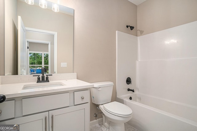 1573 Cabin Creek Trl, Griffin, GA 30223 - full bath with toilet, tub / shower combination, vanity, and baseboards