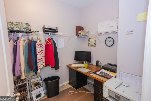 office space with baseboards