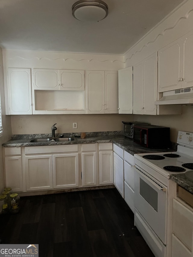 908 Crestwood Ter, Warner Robins, GA 31088 - kitchen featuring white range with electric cooktop, a sink, under cabinet range hood, dark wood-type flooring, and dark countertops