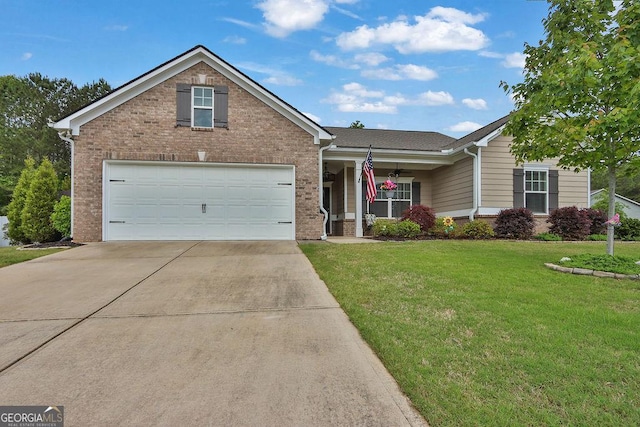 174 Crown Pointe Dr, Dawsonville, GA 30534 - view of front of home featuring brick siding, concrete driveway, a front yard, a garage, and covered porch