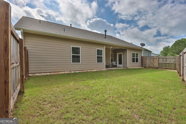 174 Crown Pointe Dr, Dawsonville, GA 30534 - back of property with a patio area