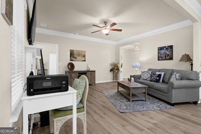 174 Crown Pointe Dr, Dawsonville, GA 30534 - living room featuring wood finished floors, crown molding, a ceiling fan, and baseboards