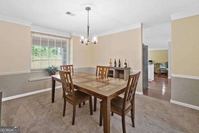 8035 Canter Ln, Alpharetta, GA 30009 - dining area featuring carpet, a chandelier, ornamental molding, and baseboards