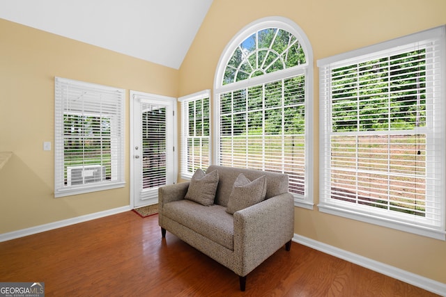 8035 Canter Ln, Alpharetta, GA 30009 - living area featuring baseboards, wood finished floors, and vaulted ceiling