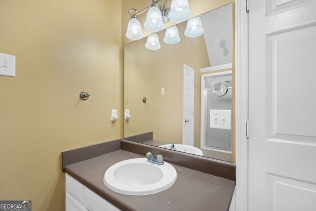 8035 Canter Ln, Alpharetta, GA 30009 - bathroom with a chandelier and vanity