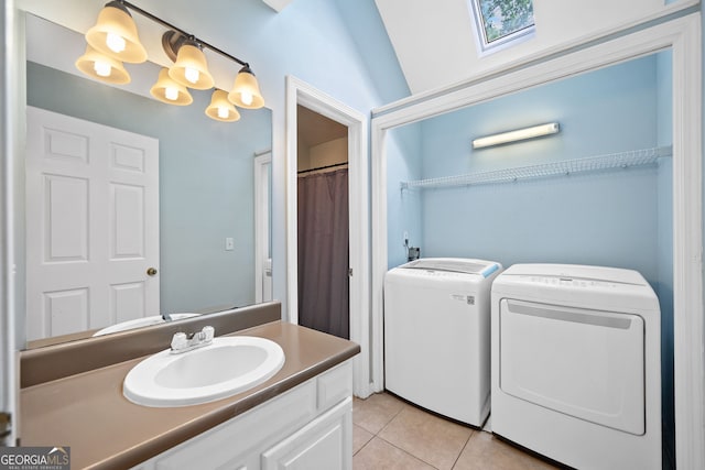 8035 Canter Ln, Alpharetta, GA 30009 - bathroom with separate washer and dryer, tile patterned floors, and vanity