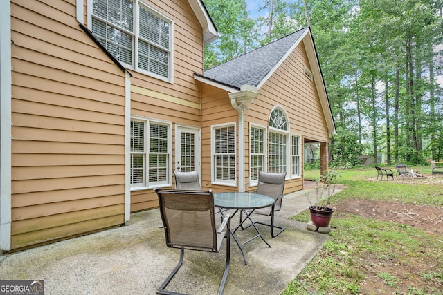 8035 Canter Ln, Alpharetta, GA 30009 - view of patio featuring a fire pit and outdoor dining space