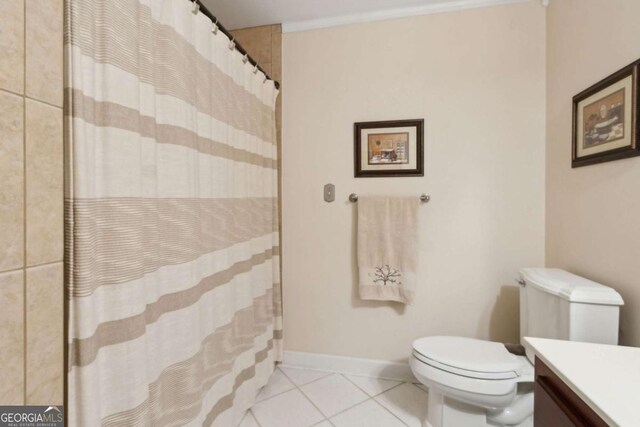 full bath with tile patterned flooring, toilet, vanity, baseboards, and curtained shower