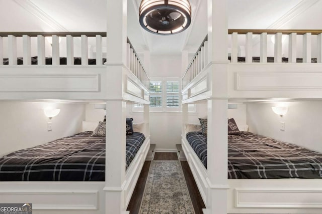 bedroom featuring dark wood finished floors