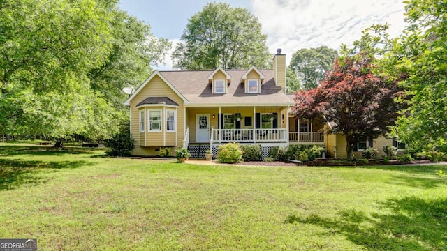 488 Mayapple Gln, Dawsonville, GA 30534 - cape cod-style house with a porch, a front yard, and a chimney