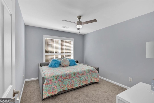 bedroom with baseboards, carpet, and ceiling fan