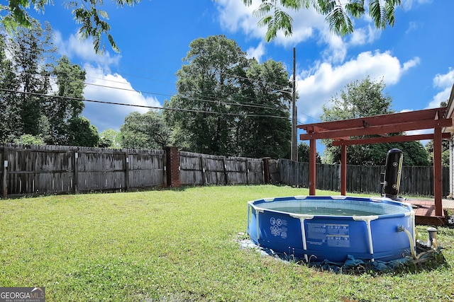 view of yard with a pergola